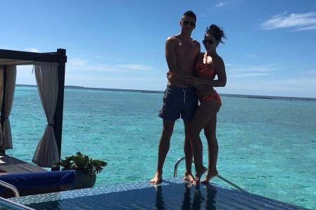 Yevhen KHACHERIDI and his wife having rest in Maldives