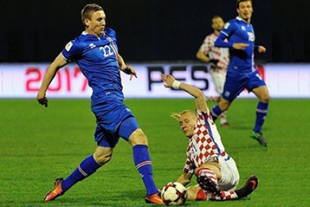 Croatia with Domagoj Vida defeat Iceland